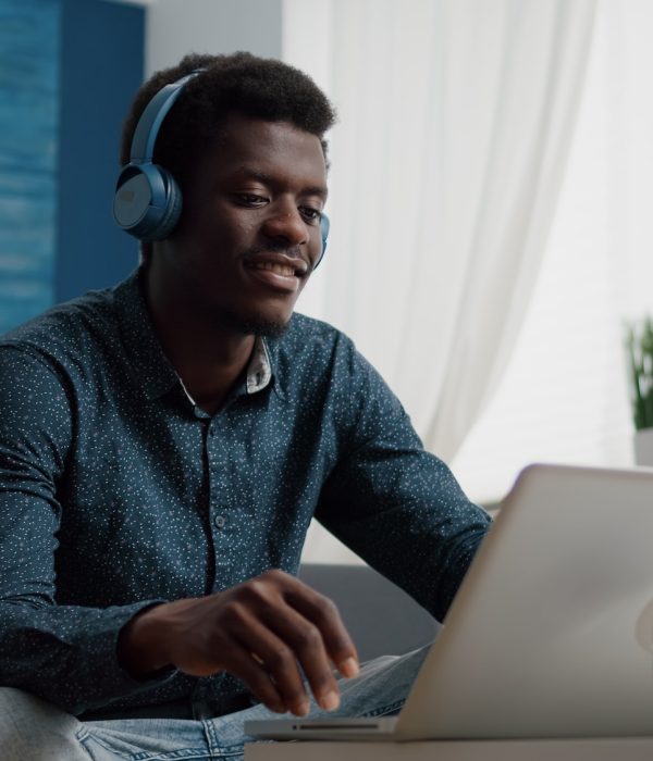 african-american-man-with-headphone-on-watching-movie-on-streaming-services.jpg